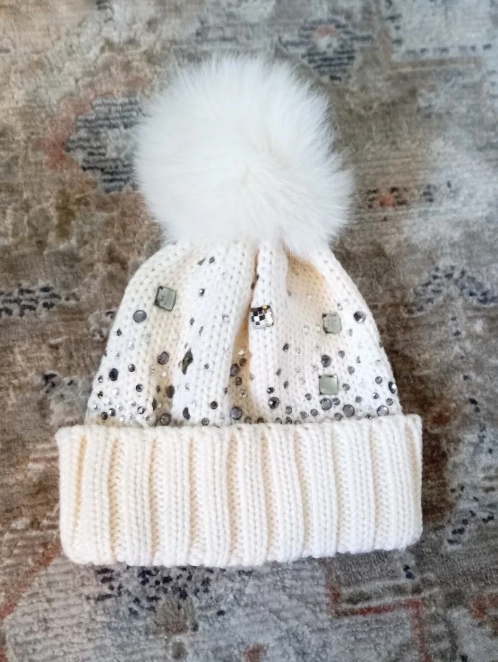 Regina Pour OG Italian cream color knit wool beanie with a real fur pom pom